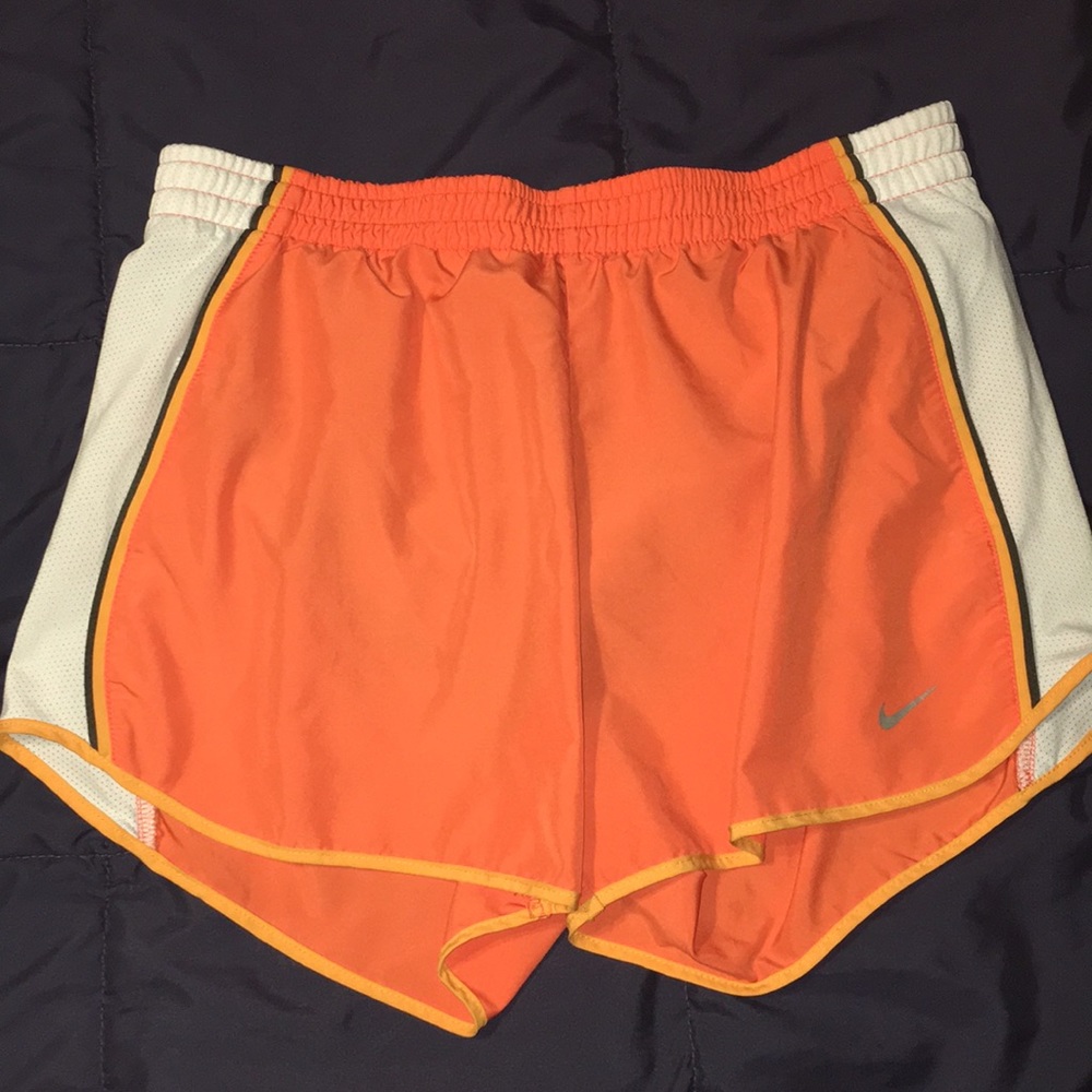Orange nike shorts